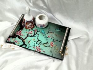 A Japanese art themed print on wooden tray.